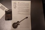 Gibson 25/50 Anniversary Belt buckle with papers